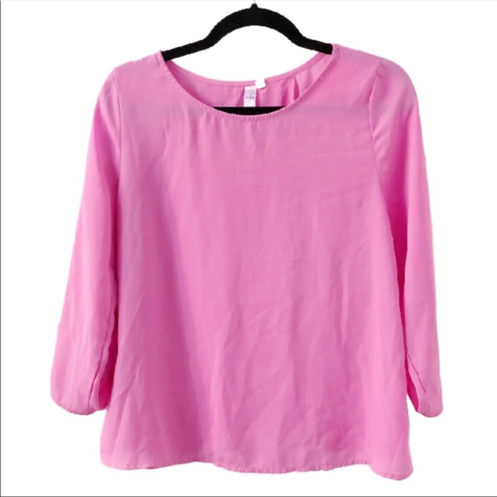 Francesca’s pink blouse